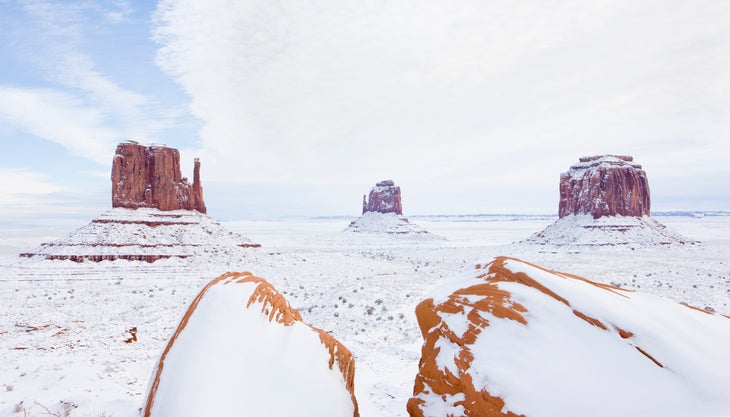 winter The Mittens and Merrick Butte, Monument Valley National Park, Utah-Arizona, USA Monument Valley at the Utah-Arizona border in winter. Pictured are The Mittens and Merrick Butte.