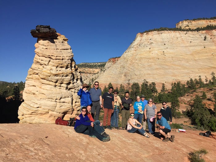 Zion-Workshop-CheckerboardMesa_DaveKrause_700 Photo workshop participants pose for a group photo at Zion's Checkerboard Mesa