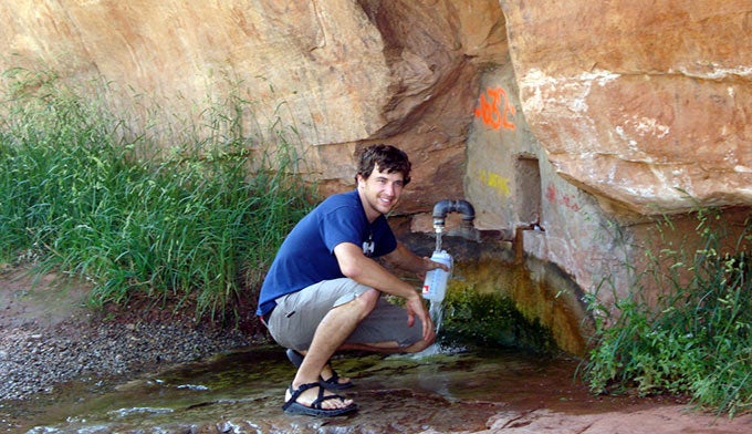Moab-Matrimony-Springs_MattBeatty_680 Filling up a water bottle at Matrimony Springs near Moab.