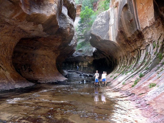Zion-Subway-hikers_WikiGodOfWar_700v Hikers in Zion National Park's Subway slot canyon