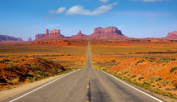 Monument-Valley-US163-Road_DP_680 The road through Monument Valley at the Utah-Arizona border.