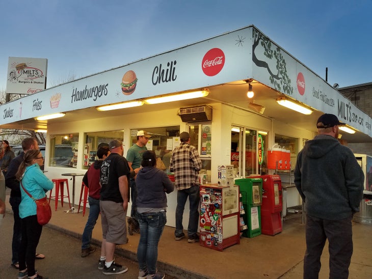 Ten minutes before closing on a Sunday night, Milt's Stop & Eat still has a long line vying for burgers off the last grill of the day at Milt's Stop N Eat in Moab.