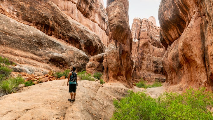 Hiker in the Fiery Furnace in Arches National Park