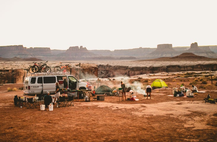 Setting up camp while Holiday River Expeditions prepares a meal on the White Rim Trail