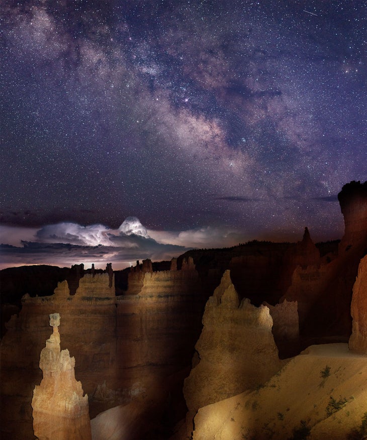 The Milky Way, a lightning storm and light painting on Thor's Hammer from Sunset Point in Bryce Canyon National Park.