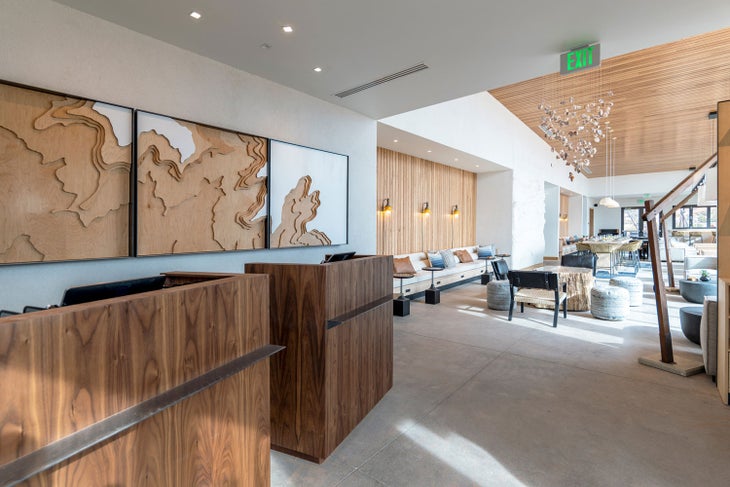 Concierge and indoor lounge and dining at ULUM by Under Canvas near Moab